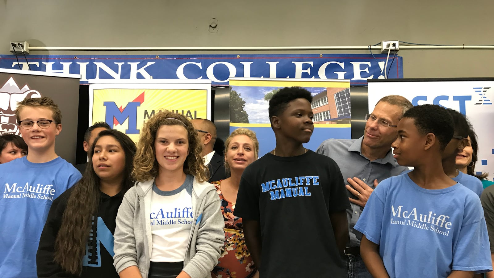 McAuliffe Manual students gather for a photo with Denver Public Schools officials at a press conference in 2017.