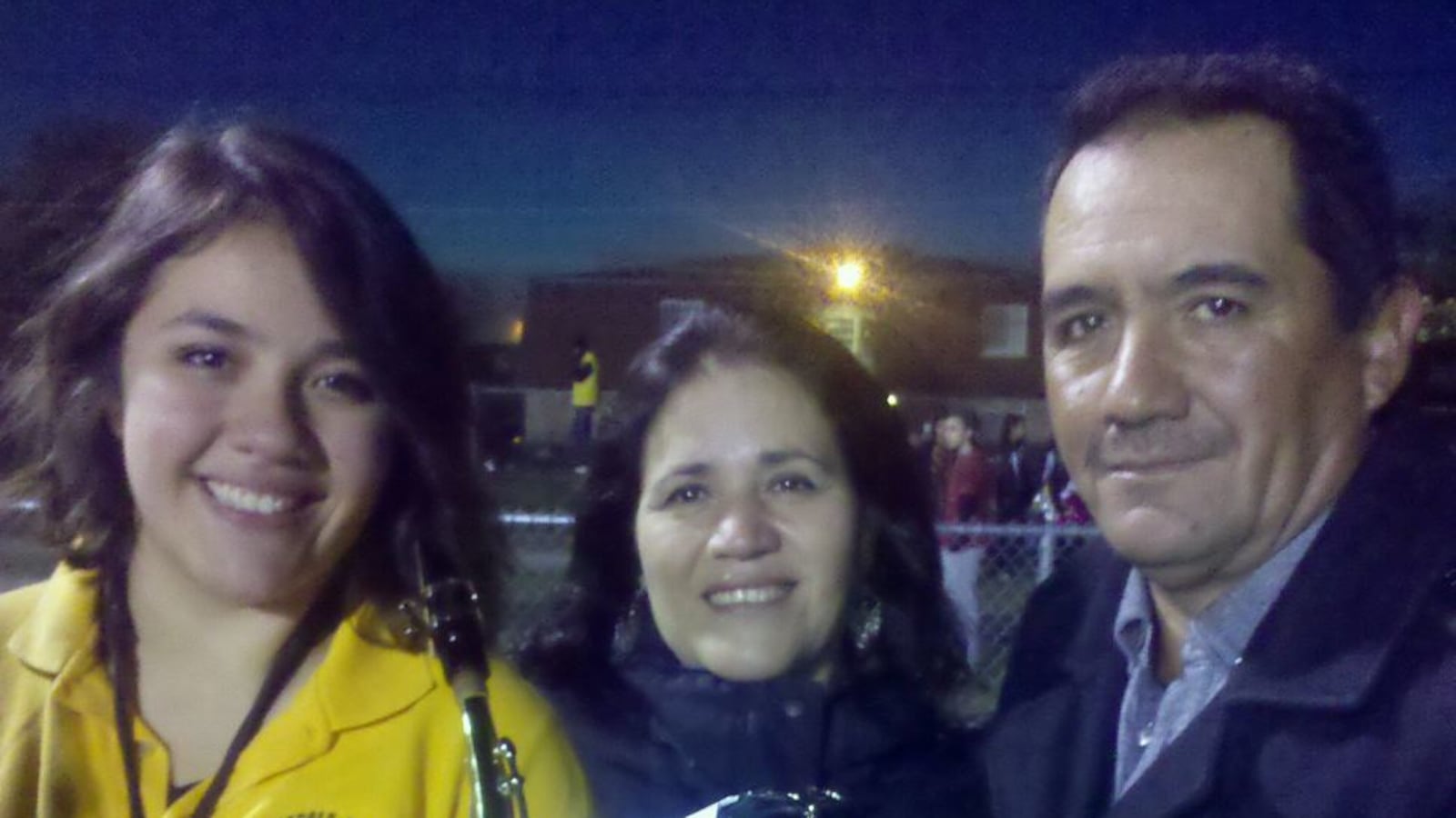 (Left to right) Jessica with her parents Maria and Luis Villagomez at a senior year send-off.