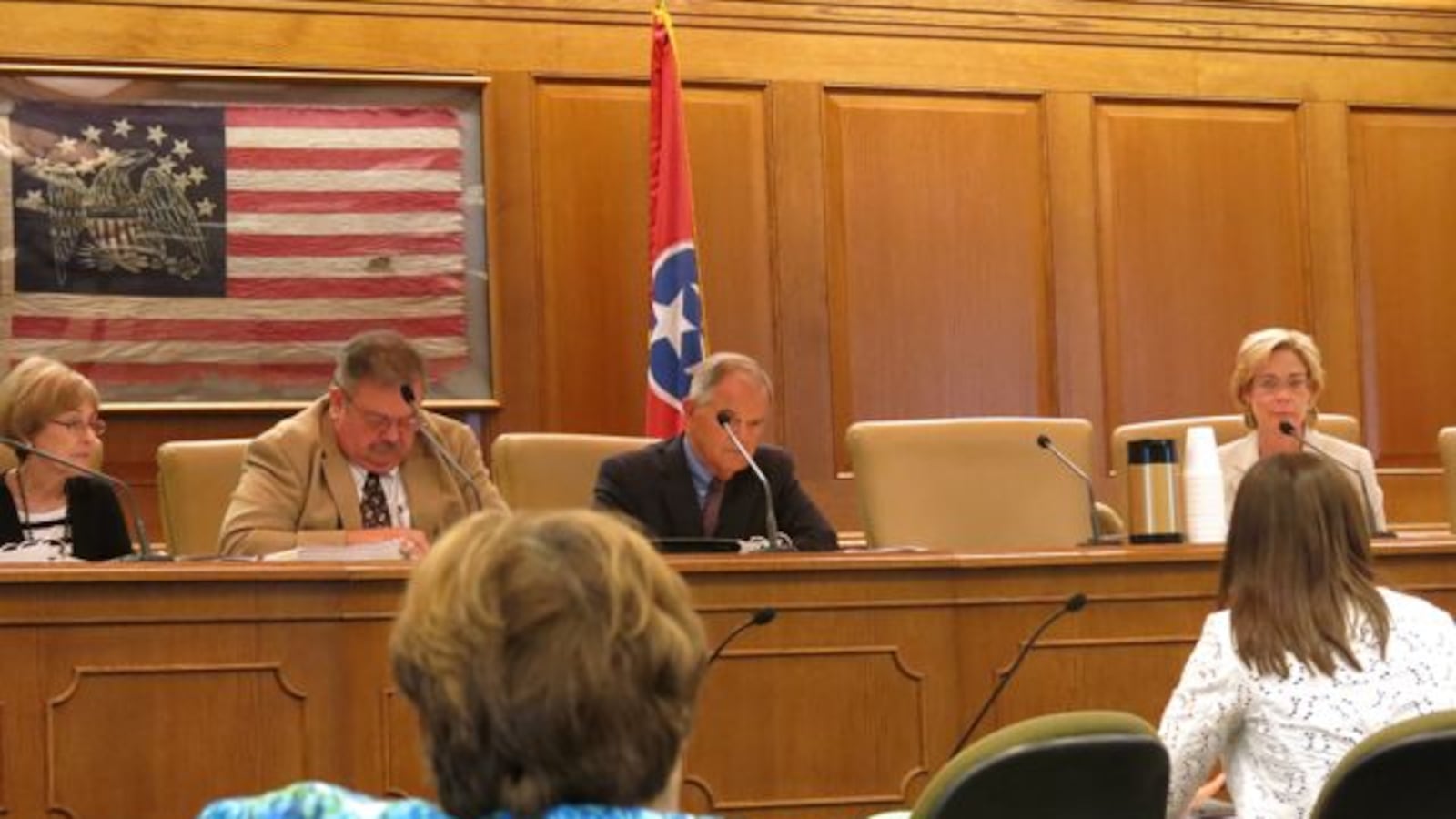 The school board observed a presentation on charter school authorization at a meeting in July.
