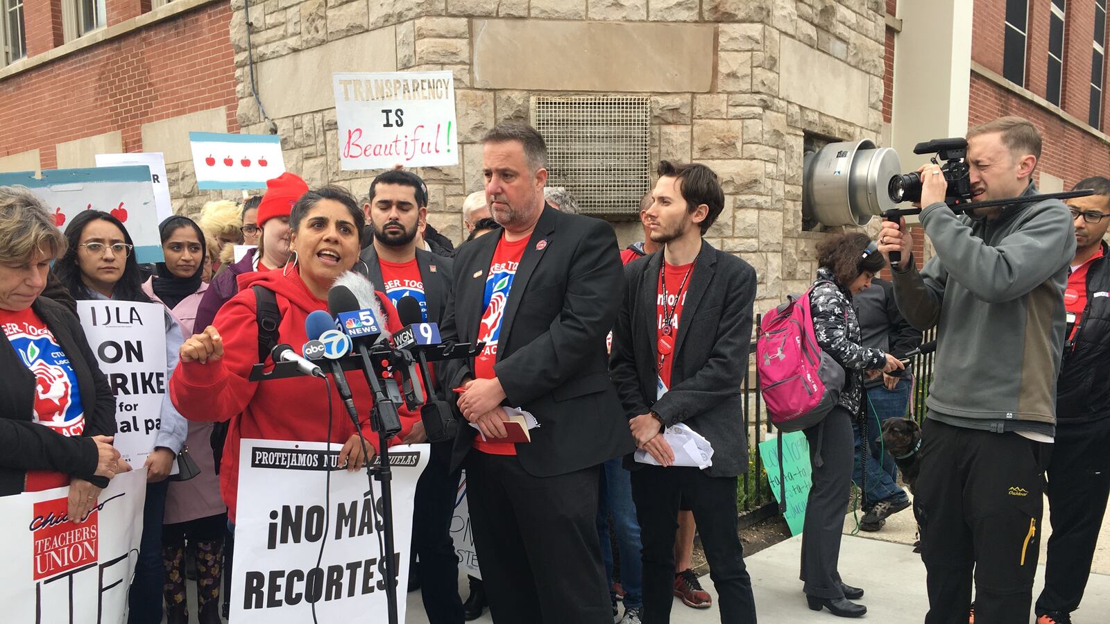 Gema Gaete, left, a counselor at Instituto Justice and Leadership Academy, addresses protesting teachers May 1, 2019, at the third charter strike to hit Chicago Public Schools.