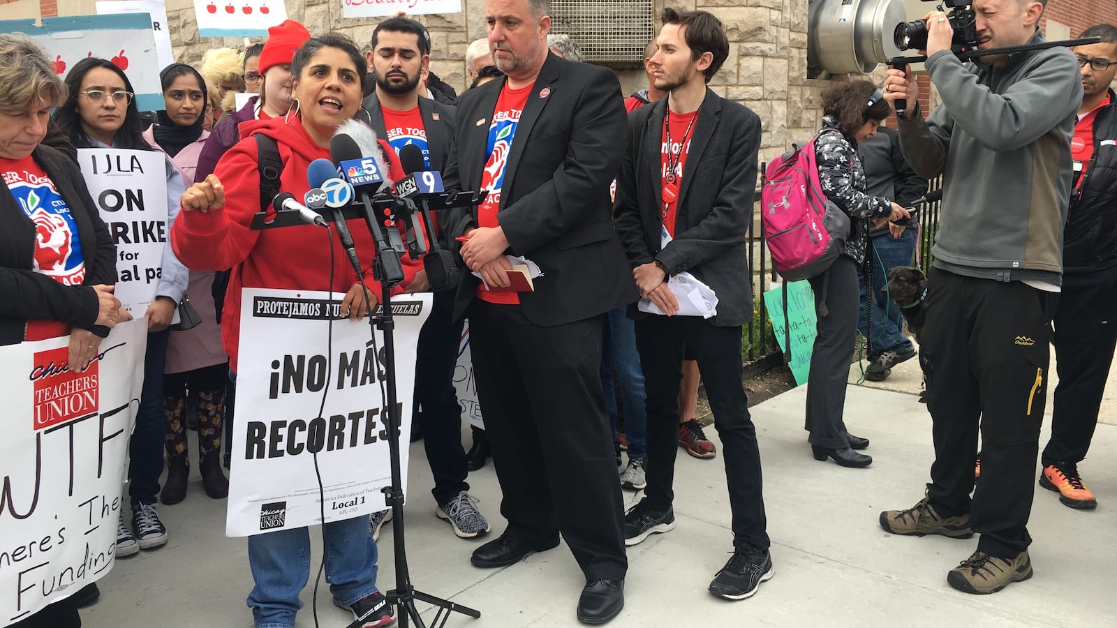 Gema Gaete, left, a counselor at Instituto Justice and Leadership Academy, addresses protesting teachers May 1, 2019, at the third charter strike to hit Chicago Public Schools.