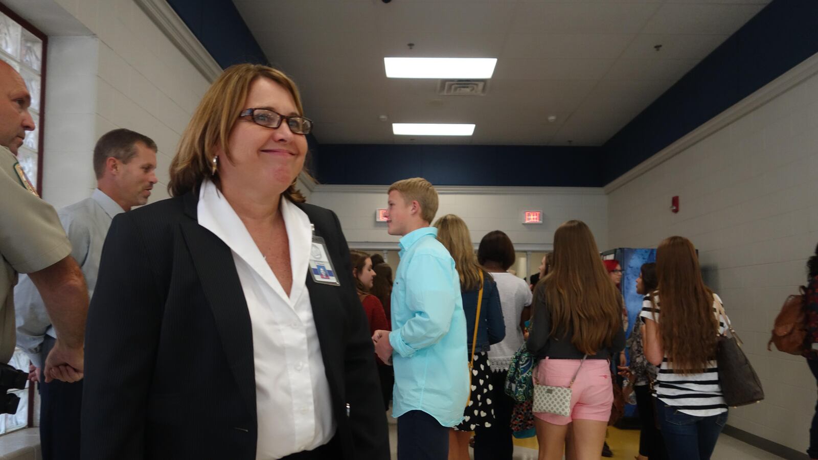 Arlington Superintendent Tammy Mason greets high school students last August on the first day of school for the new district near Memphis. (2014)