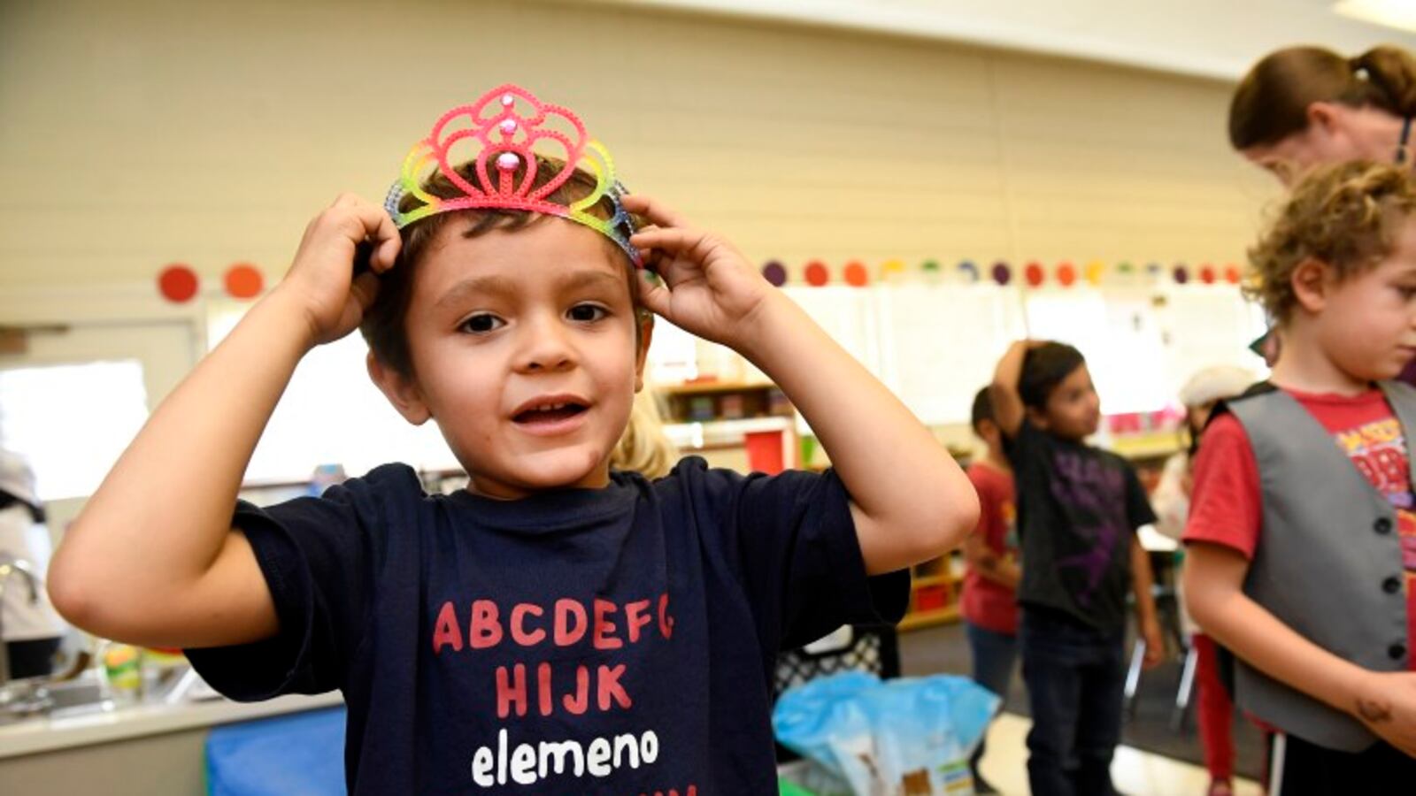 Ivan Ramirez Boyes, 5, plays dress-up during play time in the kindergarten class of Jenny Magee at University Hill Elementary School in Boulder.