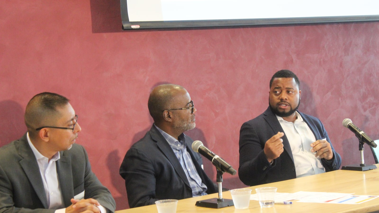 Chicago Public Schools' Chief Equity Officer, Maurice Swinney (far right), spoke on a panel about addressing trauma in youth. Also pictured, from left, are panelists Eddie Bocanegra and Bryan Samuels.