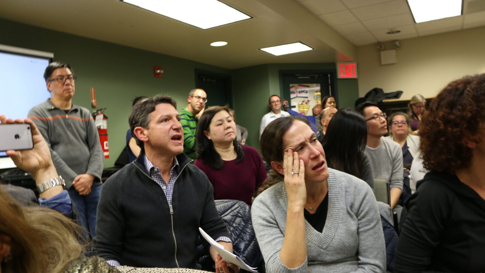Angry parents shouted questions and concerns about middle school integration plans at a December 2019 meeting of the District 28 Community Education Council.