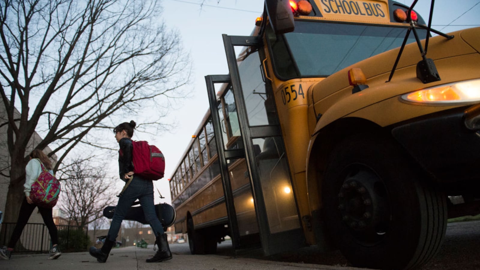 LOUISVILLE, KY: Students get off the bus in 2017 in Louisville, Kentucky, where a fight was underway about the county's longstanding desegregation efforts.