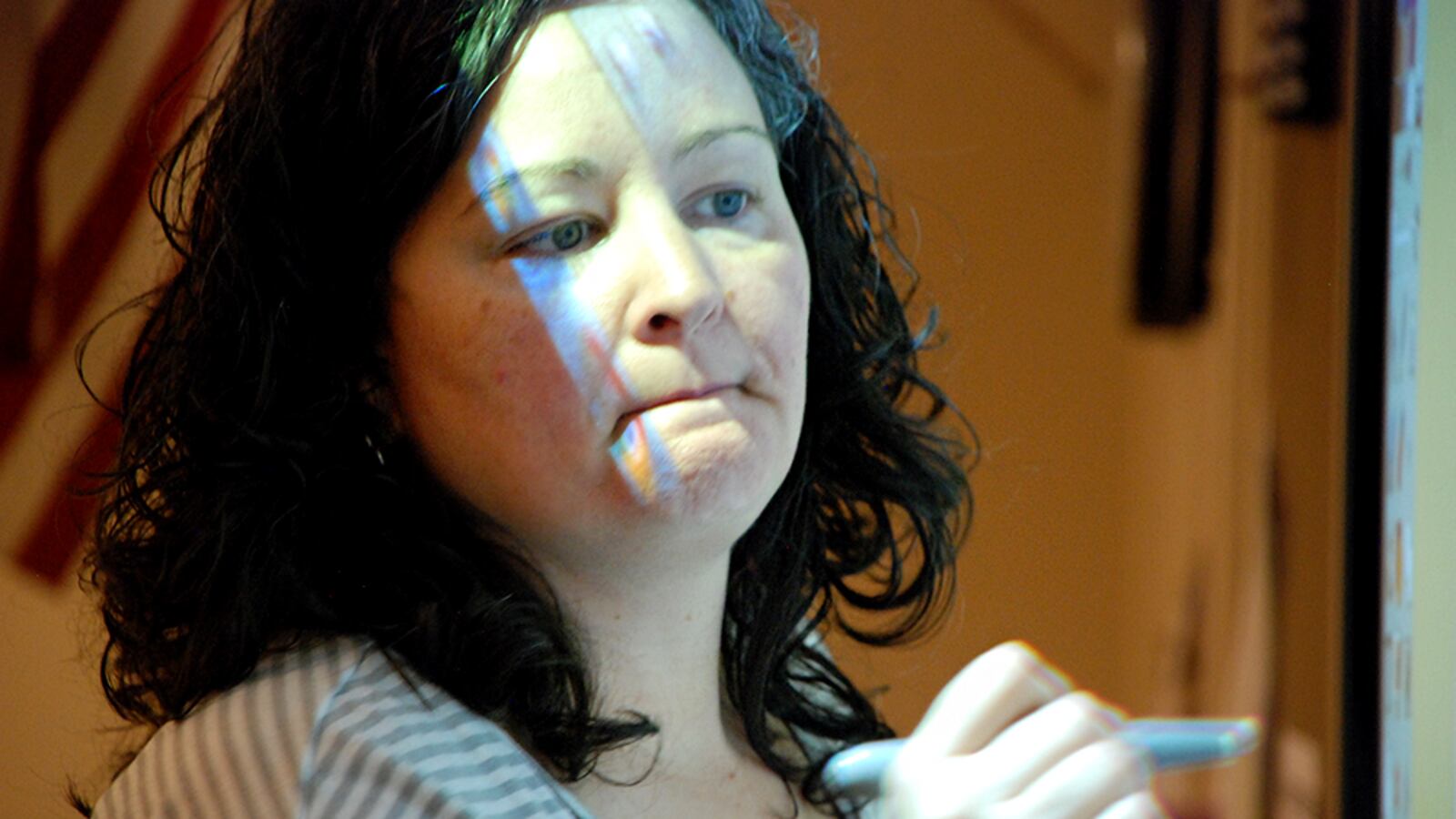 Mrachek Middle School math teacher Diardra Gascon helps students solve a math problem.