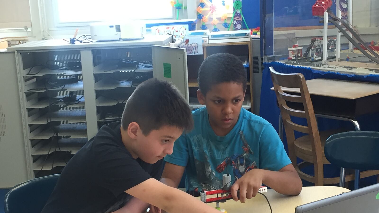 Students at P.S. 188 in Coney Island program a spinning lego top.
