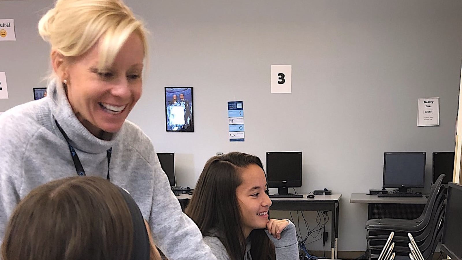 Business teacher Hilary Wimmer, Colorado's 2020 Teacher of the Year, works with students at Mountain Range High School.
