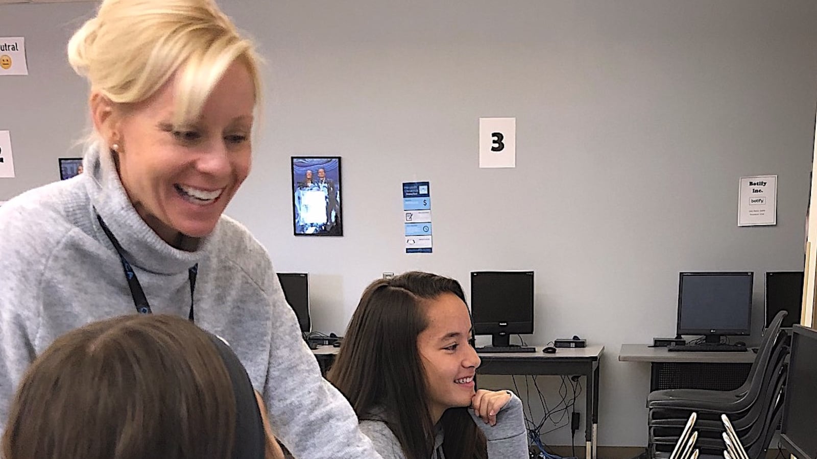 Business teacher Hilary Wimmer, Colorado's 2020 Teacher of the Year, works with students at Mountain Range High School.