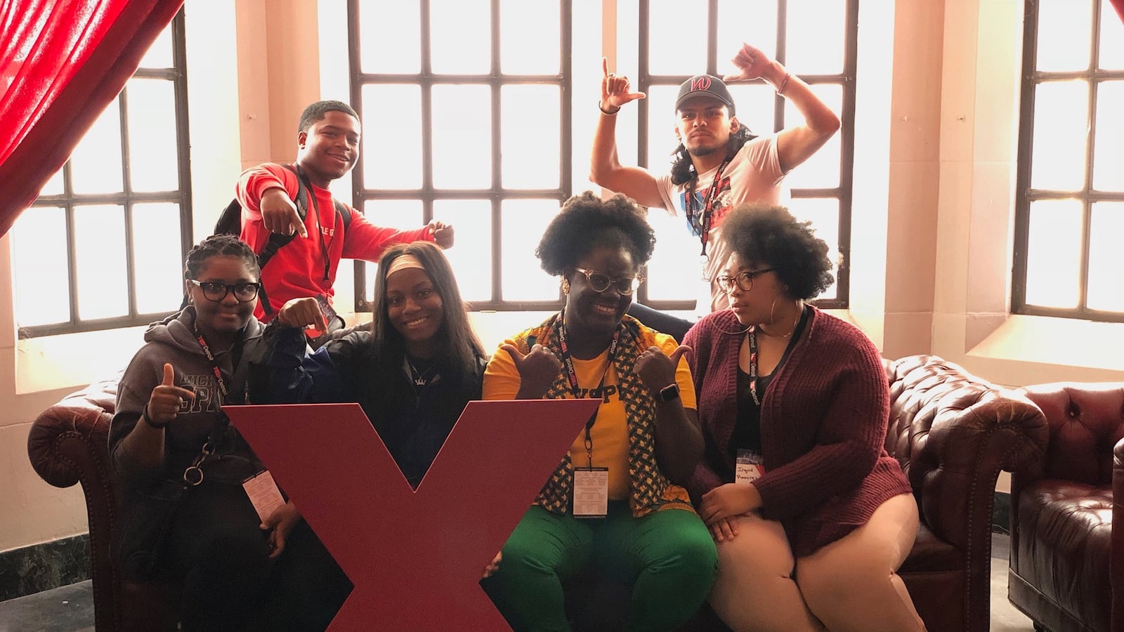 Joy Mohammed with a group of Western International High School students at TEDxDetroit at the Masonic Temple.