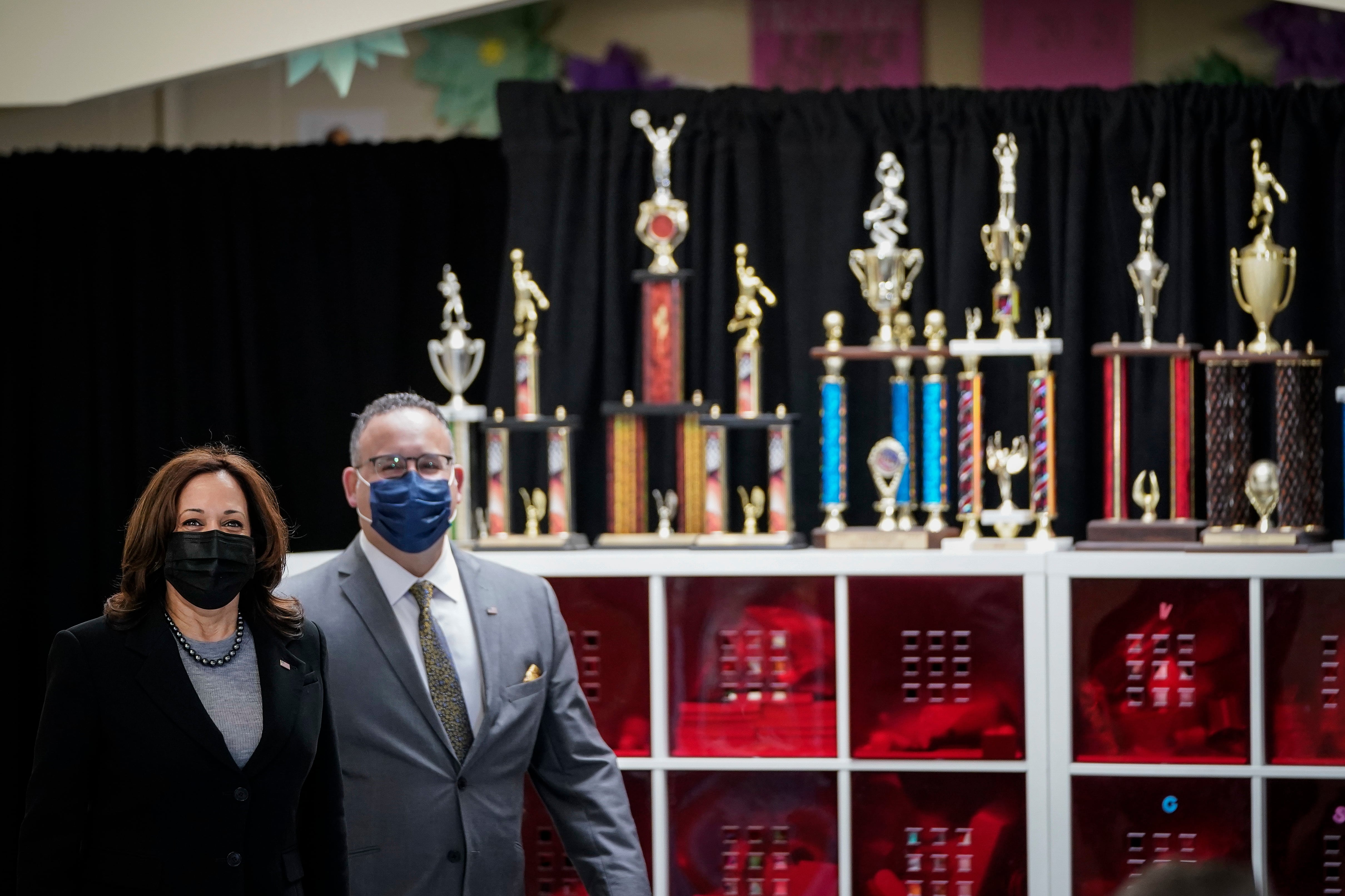 NEW HAVEN, CT - MARCH 26: (L-R) U.S. Vice President Kamala Harris and Secretary of Education Miguel Cardona arrive for a roundtable session about reducing childhood poverty at the Boys and Girls Club of New Haven on March 26, 2021 in New Haven, Connecticut. Harris is traveling to New Haven, Connecticut to promote the Biden administration’s recently passed $1.9 billion federal stimulus package. (Photo by Drew Angerer/Getty Images)