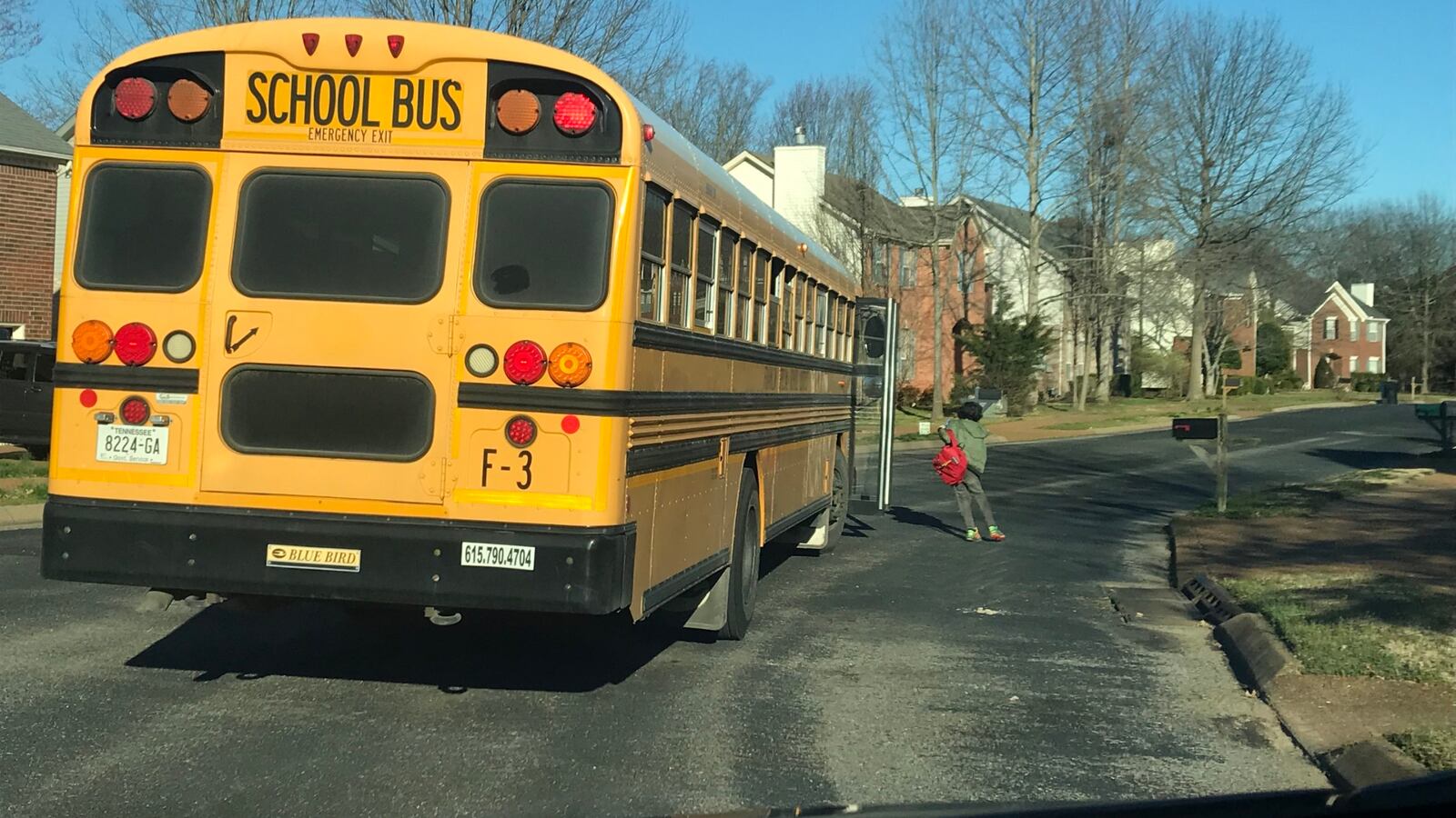 A student steps off the bus Thursday in Williamson County, where two school districts will be closed for two days after a resident was diagnosed with the new coronavirus. Williamson County is located south of Nashville.