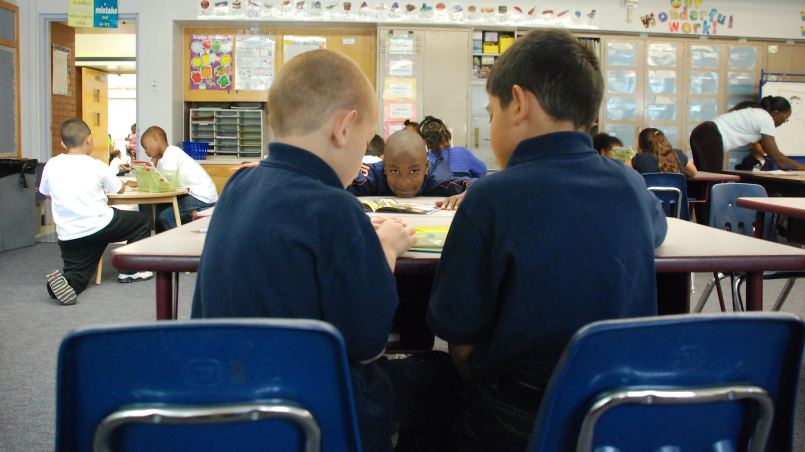 Students go to work at a Denver elementary school.
