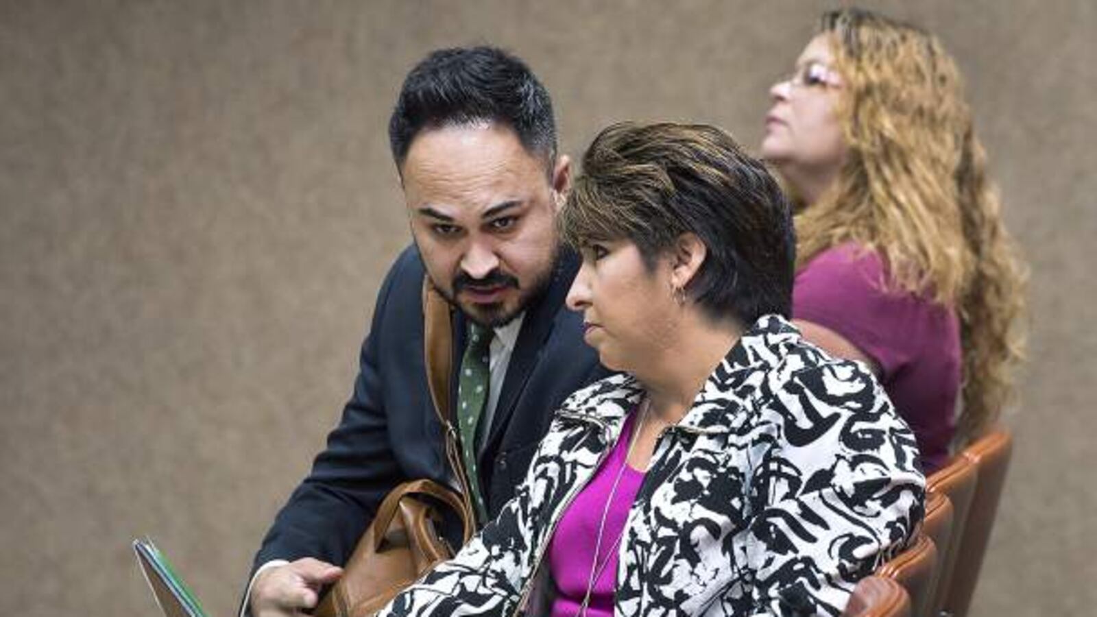 Charlotte Macaluso, right, speaks with Pueblo City Schools spokesman Dalton Sprouse on July 22, 2016. (Pueblo Chieftain file photo)