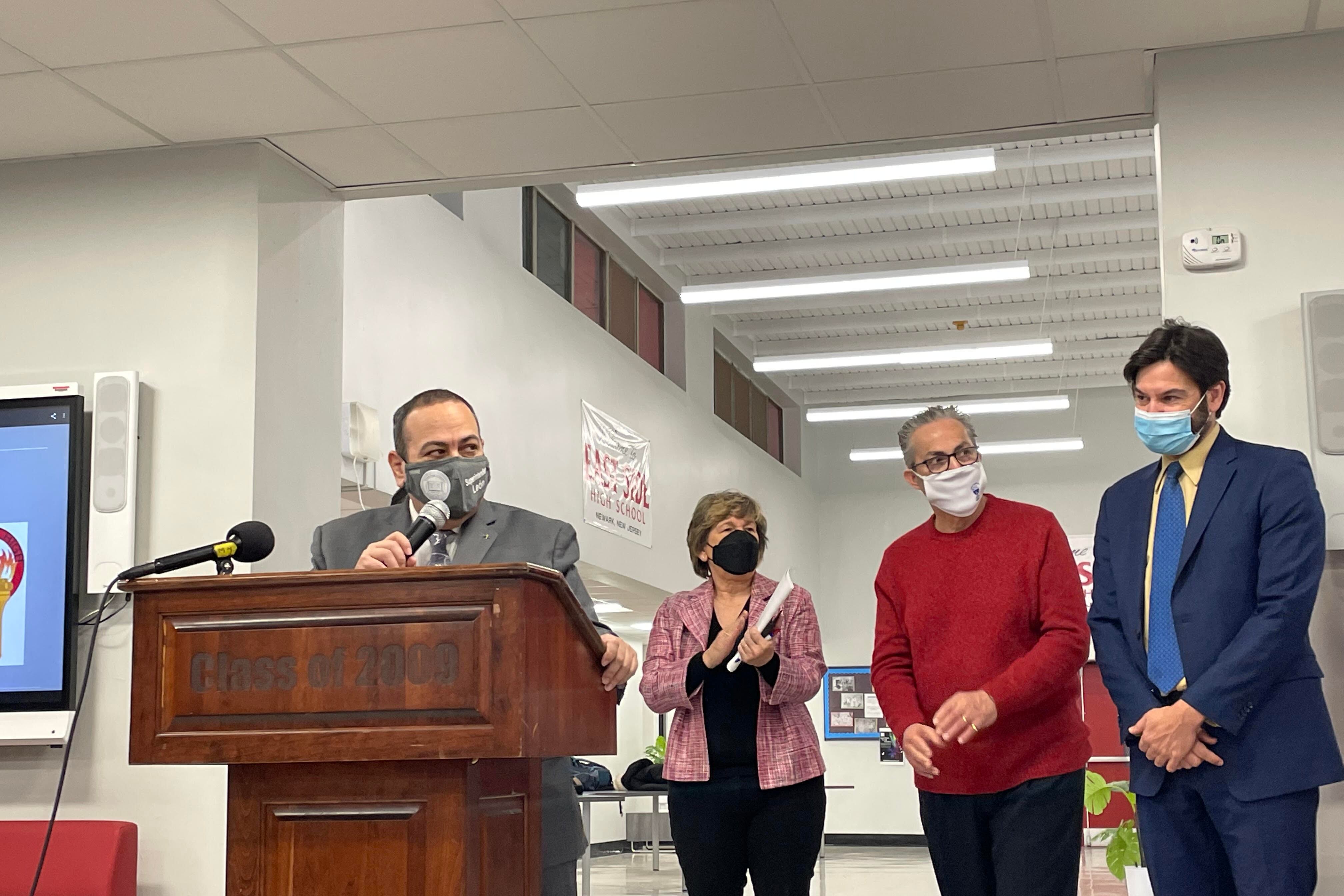 Newark Superintendent Roger León, flanked by AFT President Randi Weingarten, Newark Teacher’s Union President John Abeigon, and Montclair State University President Jonathan Koppell at East Side High School in Newark.