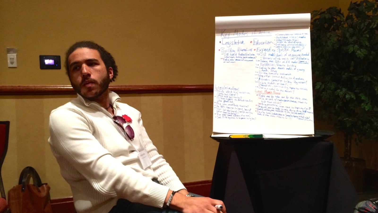 Roshan Bliss, an organizer from the Colorado Student Power Alliance, takes notes during a work session Saturday at the United Opt-Out conference in downtown Denver.