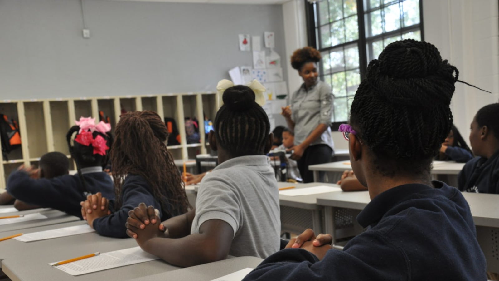 Angelique Hines gets her students' attention during a lesson.