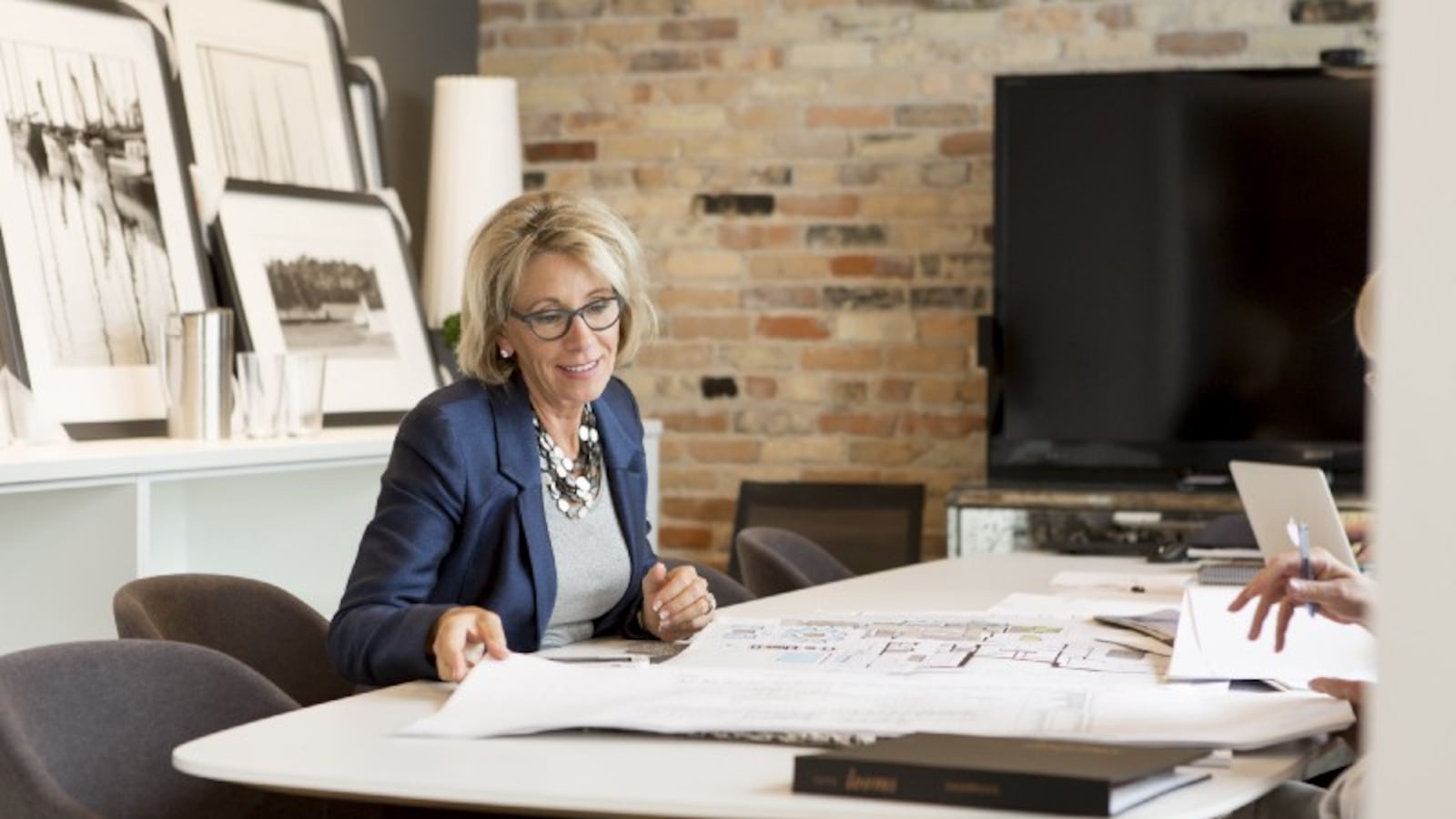 Betsy DeVos of Michigan has helped shape her state's schools through advocacy and philanthropy and is President-elect Donald Trump's nominee to be U.S. secretary of education.