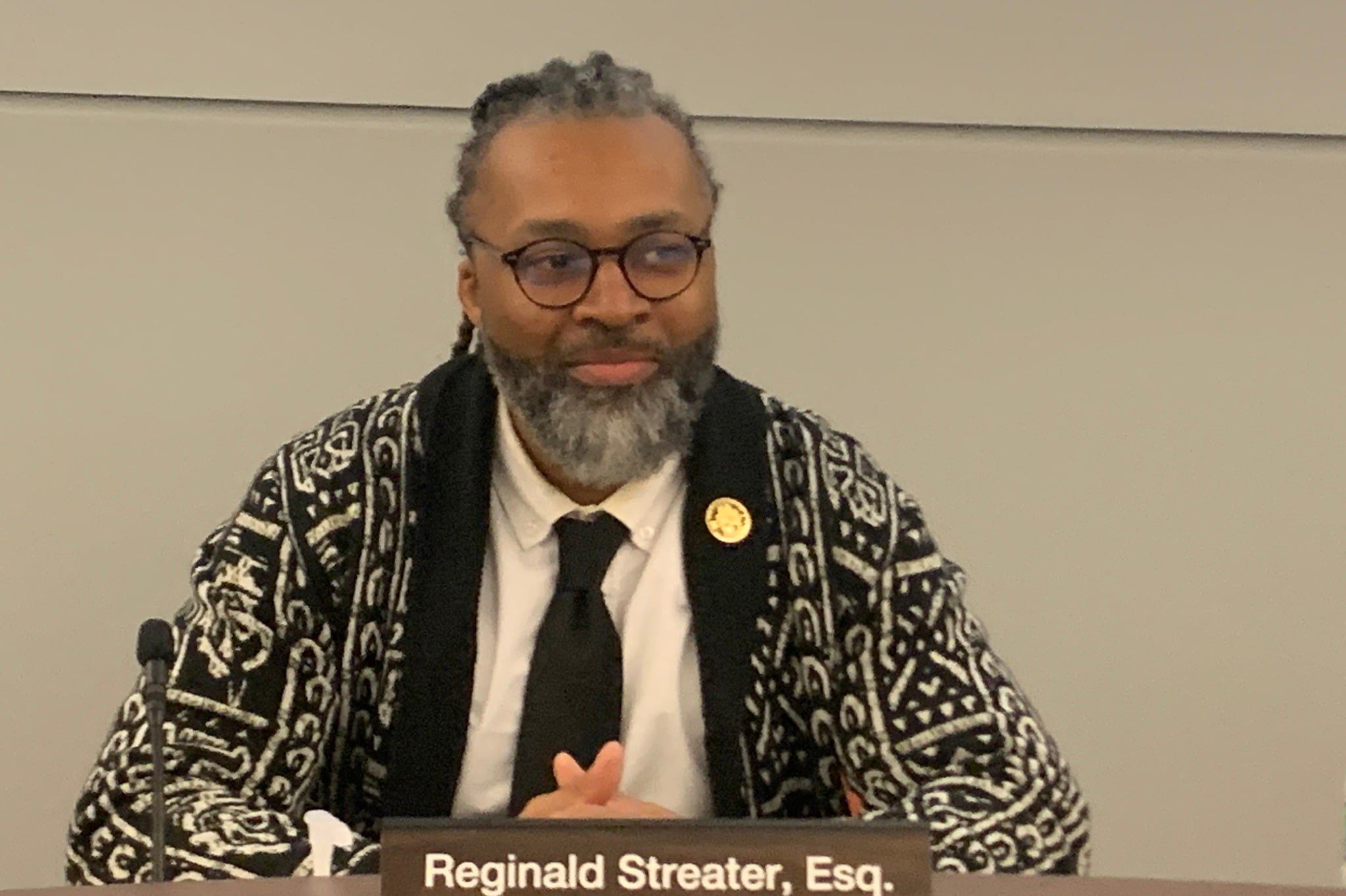 Reginald Streater sits in president’s chair