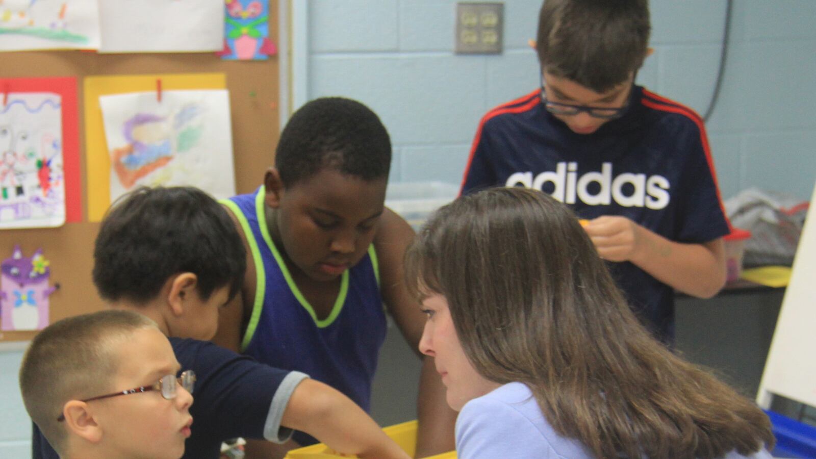 Education Commissioner Candice McQueen visits students in 2015 at Camp Explore, a summer reading program in Nashville under Tennessee's "Read to be Ready" initiative.