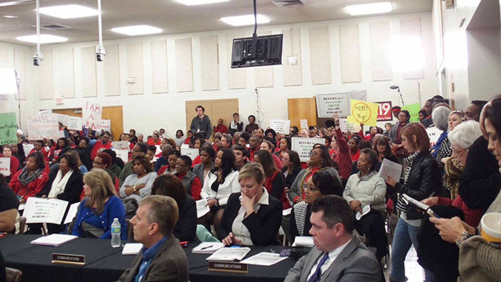 Hundreds of teachers attend the Shelby County School Board meeting in January to express concern about the district's performance-based pay plan.