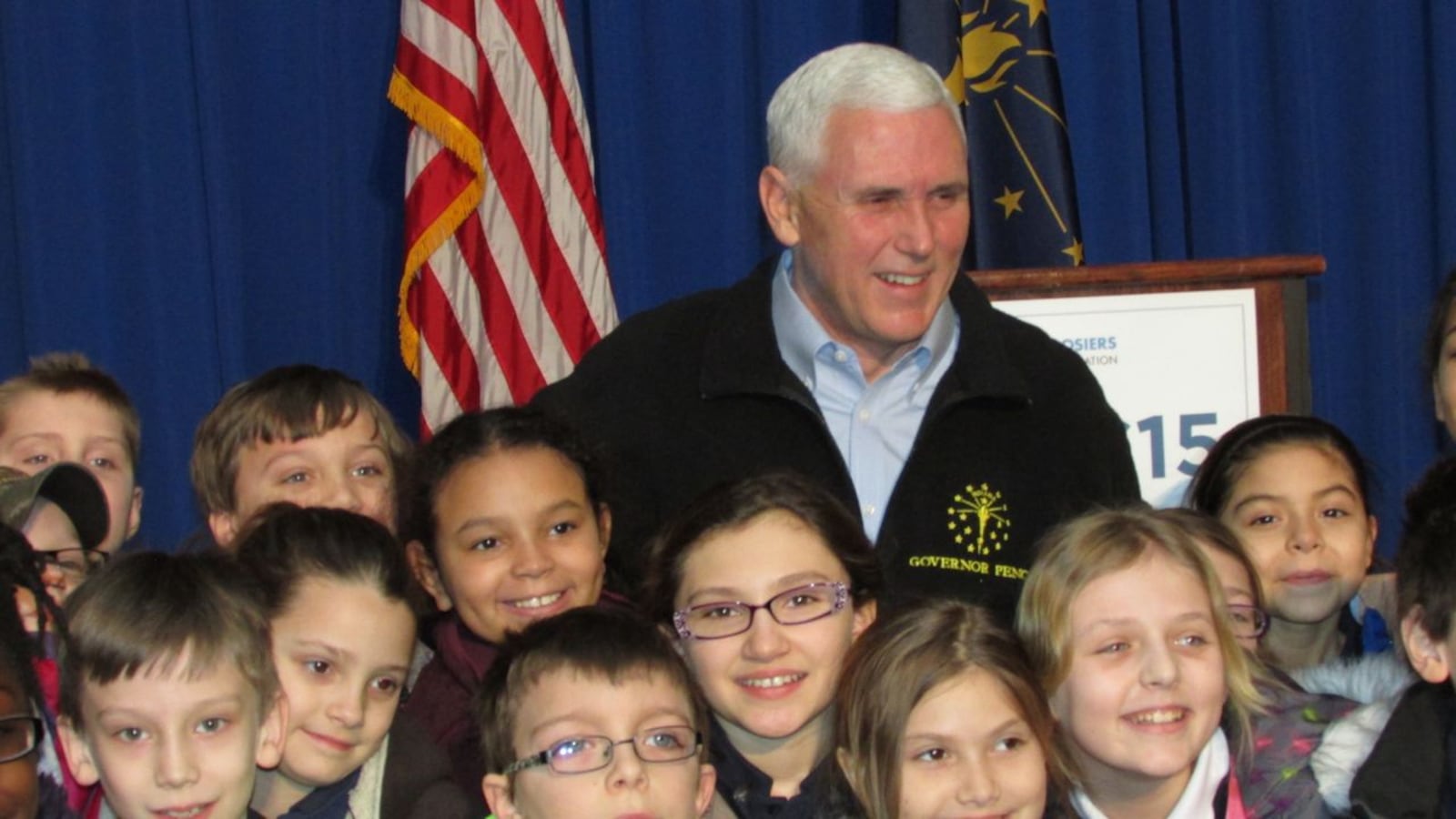 Gov. Mike Pence poses with students from Indianapolis' St Therese Little Flower Catholic School at an annual school choice rally sponsored by the Friedman Foundation in 2015.
