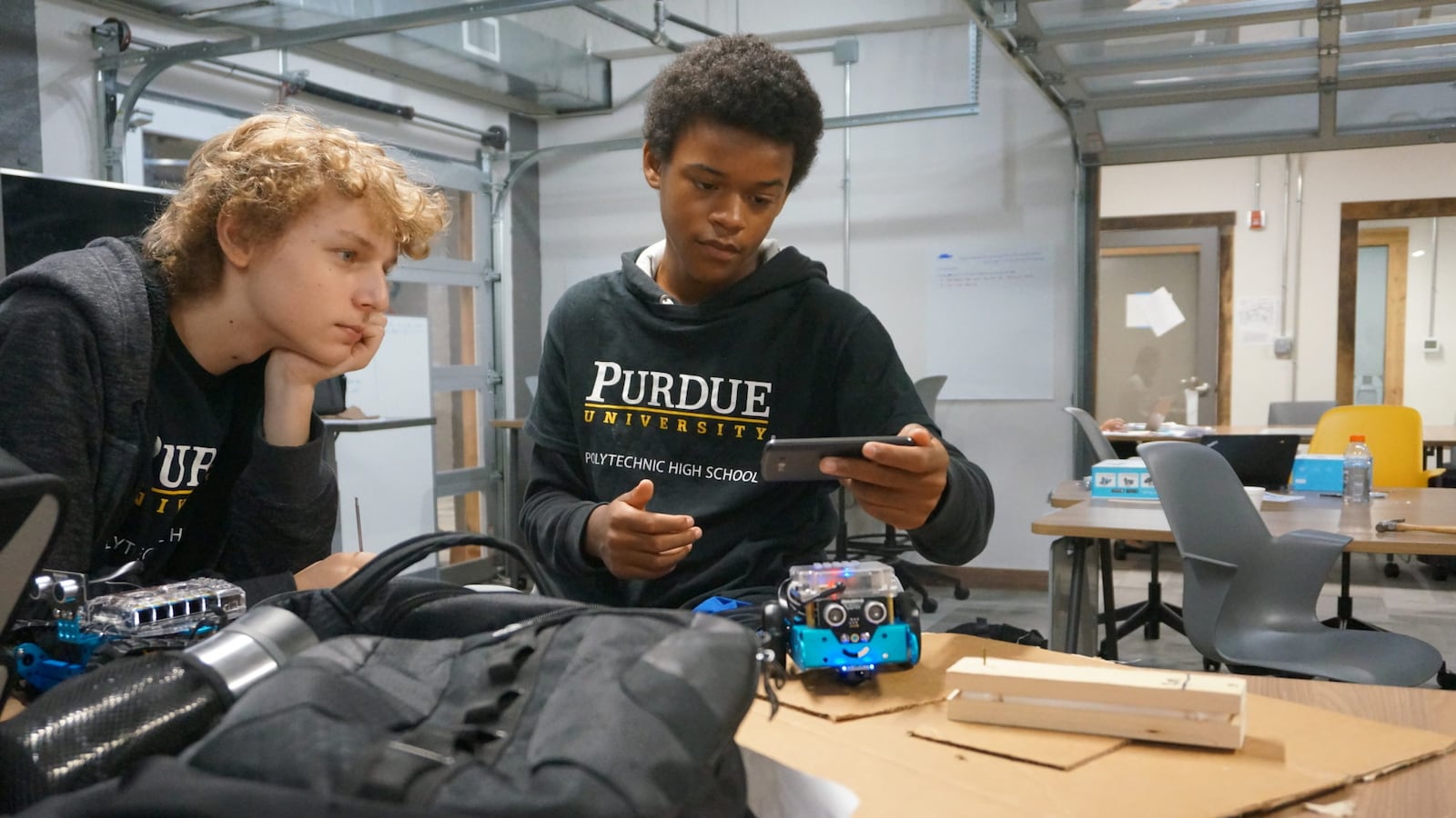 Phoenix Clark, right, is a freshman at Purdue Polytechnic High School. During his first project his team designed a filter to help clean the White River.