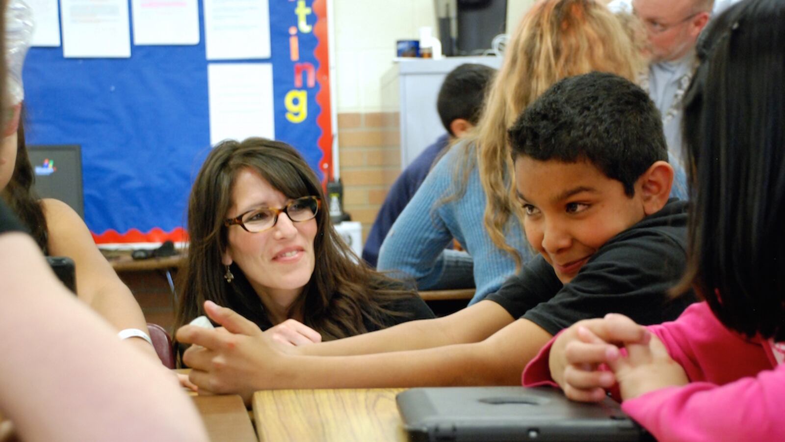 Lumberg Elementary School principal Rhonda Hatch-Rivera visits with students Thursday. She hopes a proposed overhaul of schools, including hers, yields more social and emotional support for students.