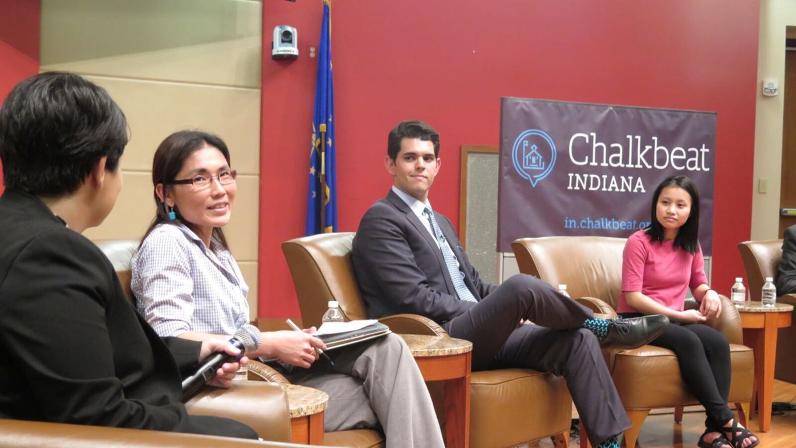 A panel discussion at the Central Library tonight focused on English language learners. Pictured are moderator Hayleigh Colombo of Chalkbeat; May Oo Mutraw, the founder of the Buremese Community Center for Education; Indianapolis Public Schools teacher Eddie Rangel; and Southport High School student Elly Mawy.