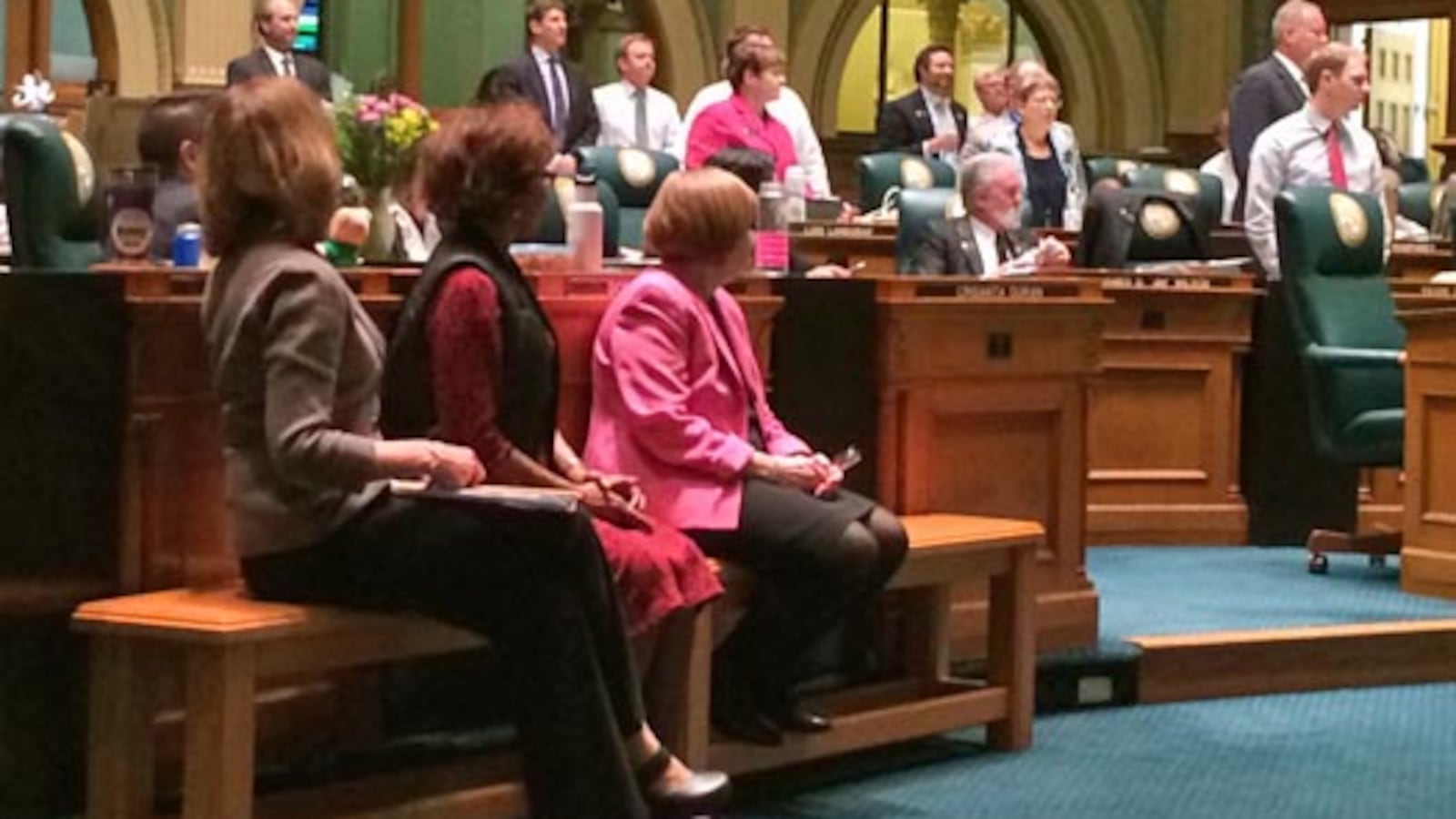 Testing bill sponsor Rep. Millie Hamner (left) watches as House takes a standing vote on an amendment.