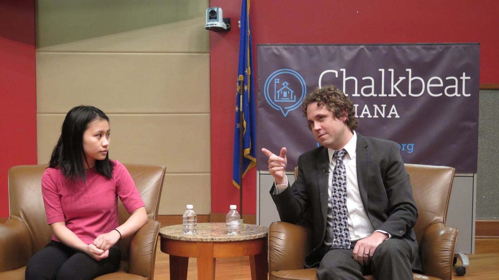 Charlie Geier of the Indiana Department of Education and Southport High School Student Elly Mawi speak on a panel hosted by Chalkbeat and WFYI at the Indianapolis Public Library.