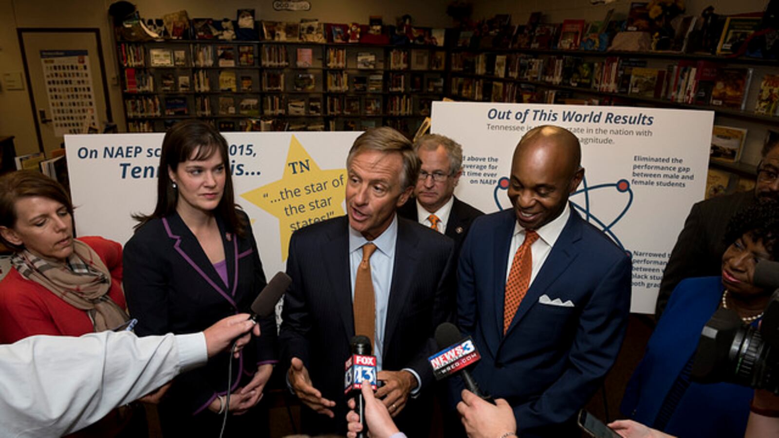 Education Commissioner Candice McQueen and Shelby County Schools Superintendent Dorsey Hopson flank Gov. Bill Haslam at a 2016 event in Memphis.