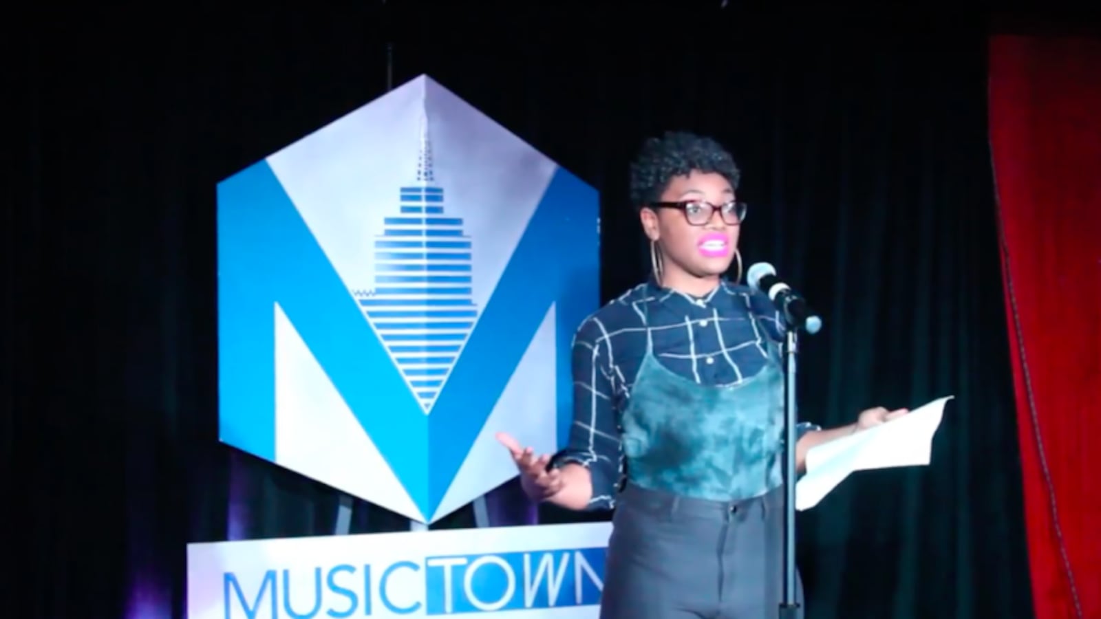 Silver Danielle Moore, a teacher at the Detroit Leadership Academy, tells her story at the Tale the Teacher storytelling event on October 6, 2018.