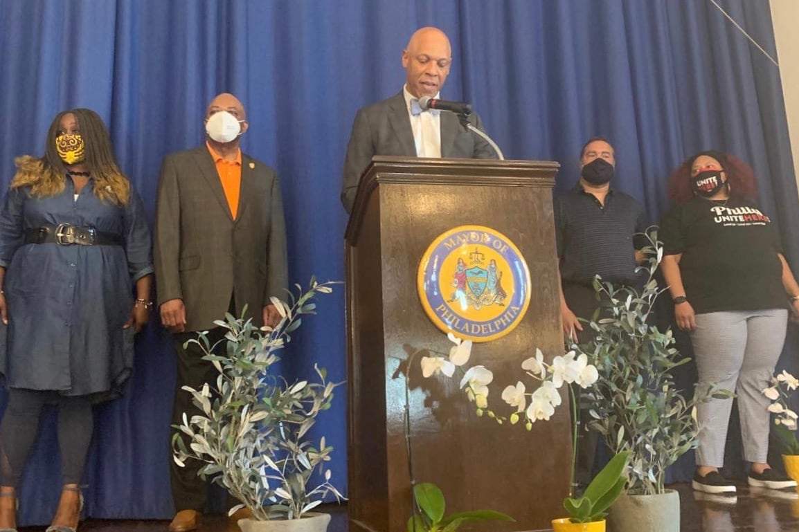 Superintendent William Hite, center, with Robin Cooper, left, president of Teamsters Local 502/CASA, Jerry Jordan, president of Philadelphia Federation of Teachers, Royce Merriweather, of the union representing school safety officers and Nicole Hunt, right, president of Local 634.