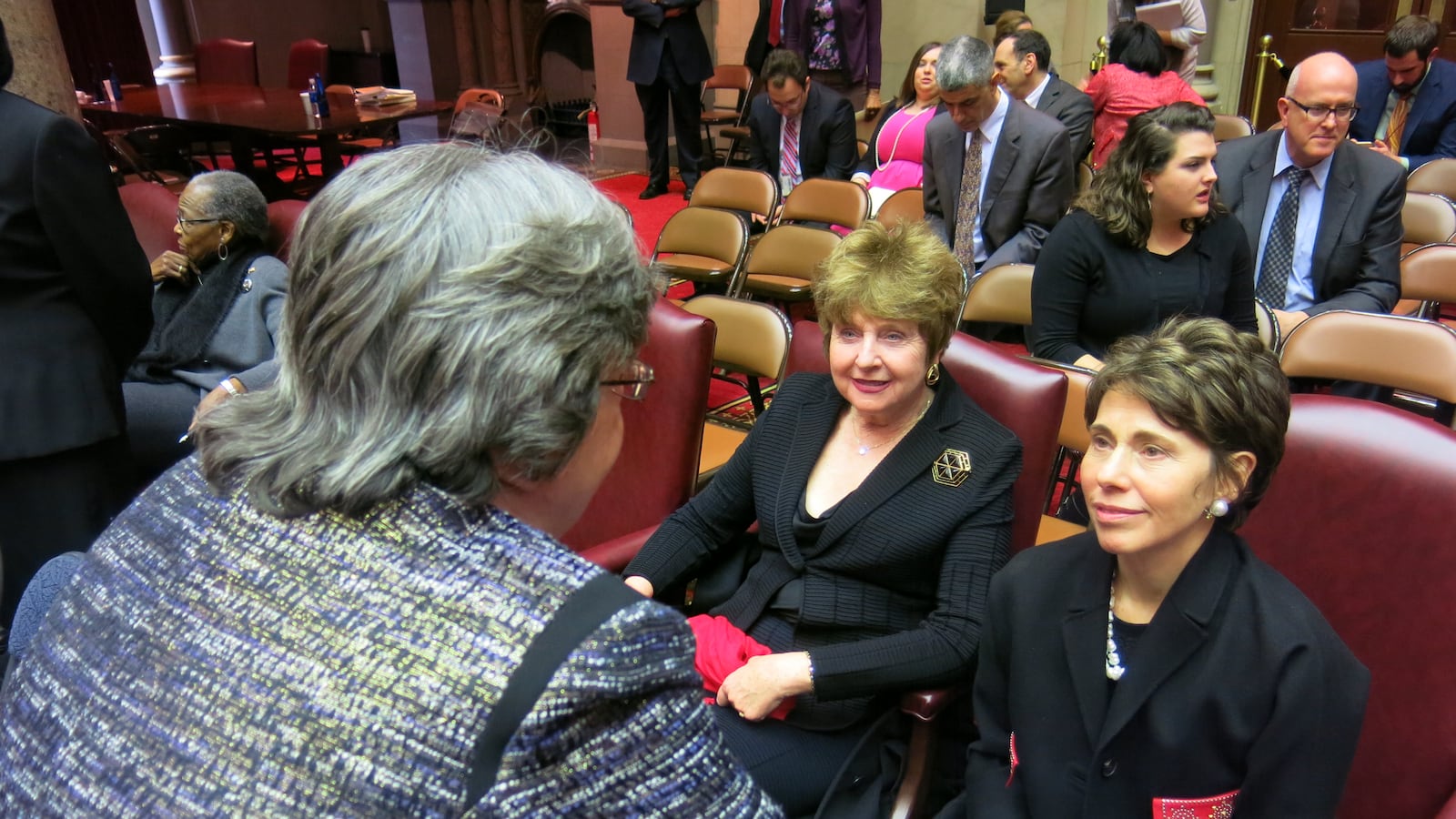 Catherine Nolan, speaking to Board of Regents Chancellor Merryl Tisch (right) and Regent Kathleen Cashin.