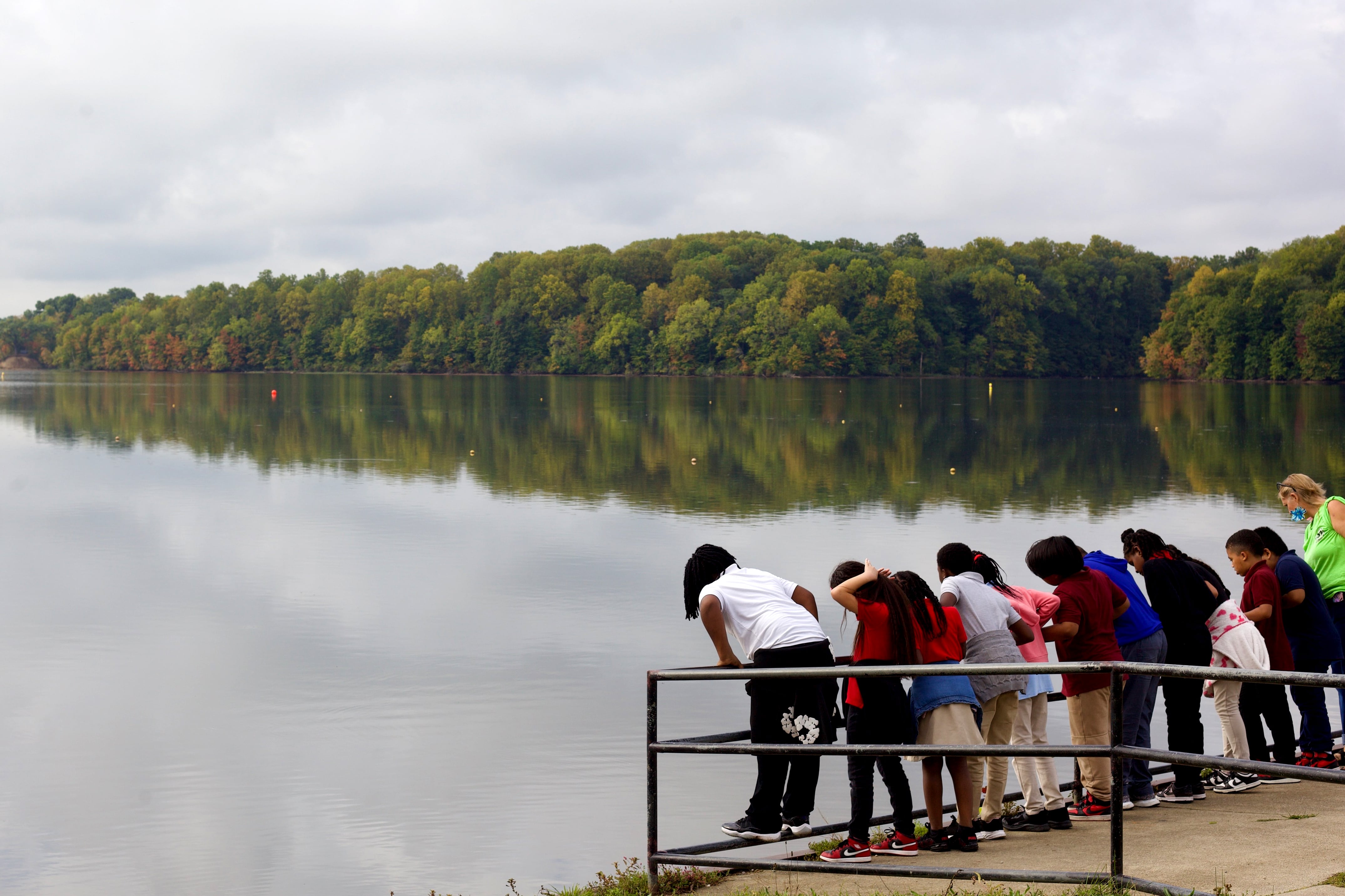 Pike students look out over Eagle Creek Reservoir from a railing.