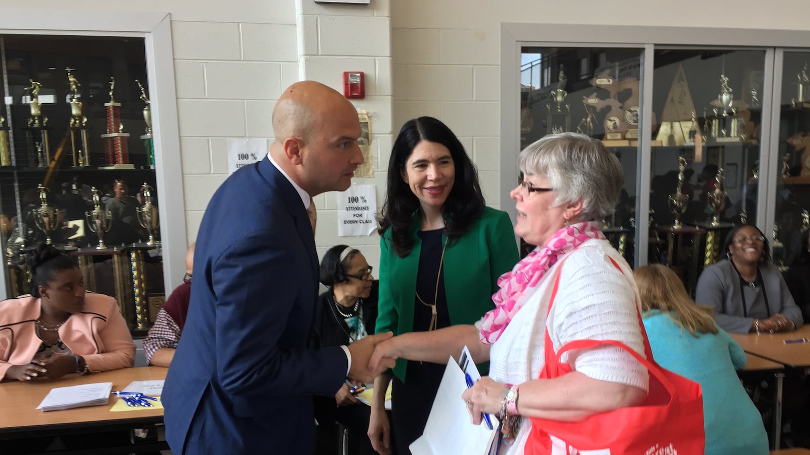 Detroit superintendent Nikolai Vitti named his first deputy, former Interim Superintendent Alycia Meriweather, center. She introduced Vitti in May as he met with principals and applicants at a job fair.