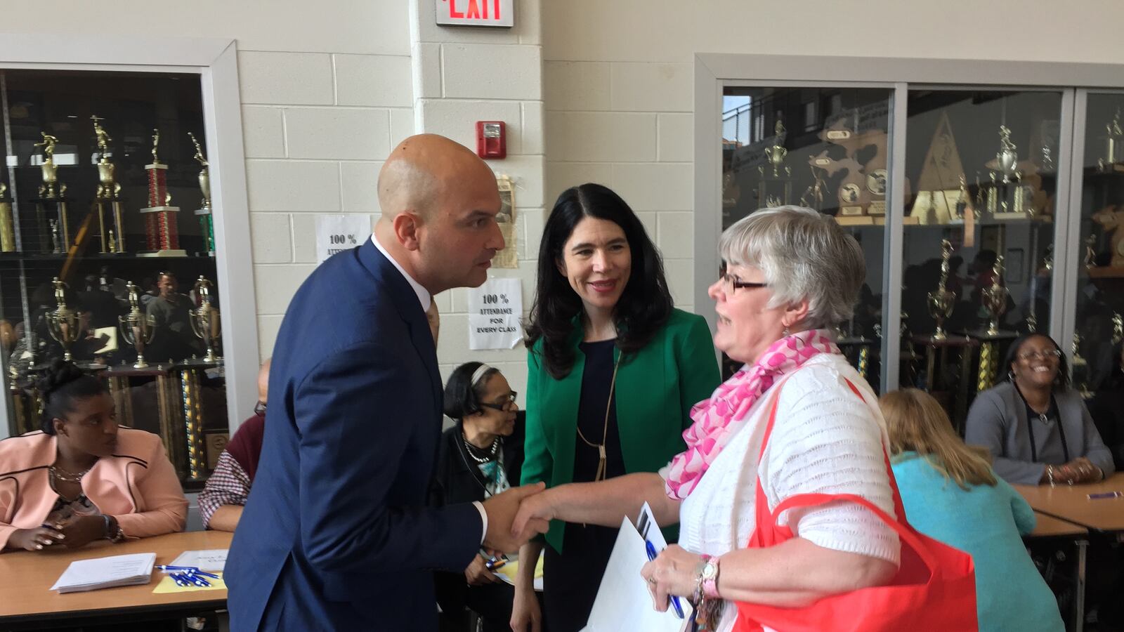 Detroit superintendent Nikolai Vitti named his first deputy, former Interim Superintendent Alycia Meriweather, center. She introduced Vitti in May as he met with principals and applicants at a job fair.