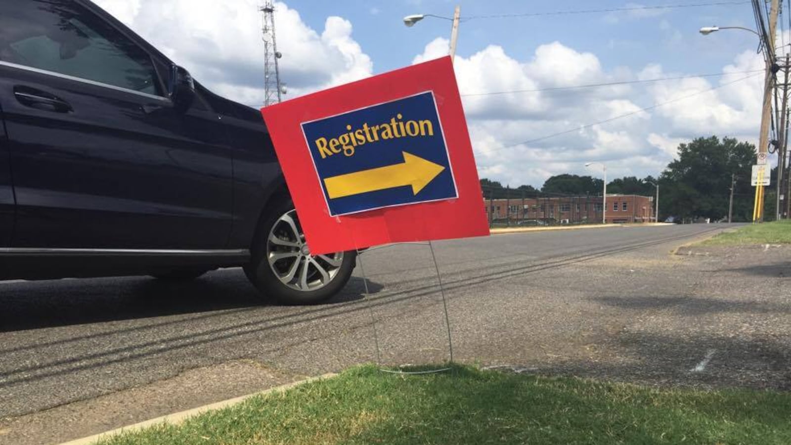 A sign points the way to a registration event inside the headquarters of Shelby County Schools.