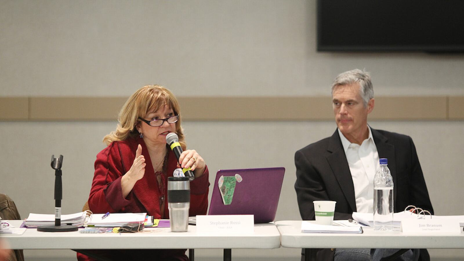 Wheat Ridge High School history teacher Stephanie Rossi, left, and lawyer for Jeffco Public Schools Jim Branum discussed the county's teacher contract in 2015.