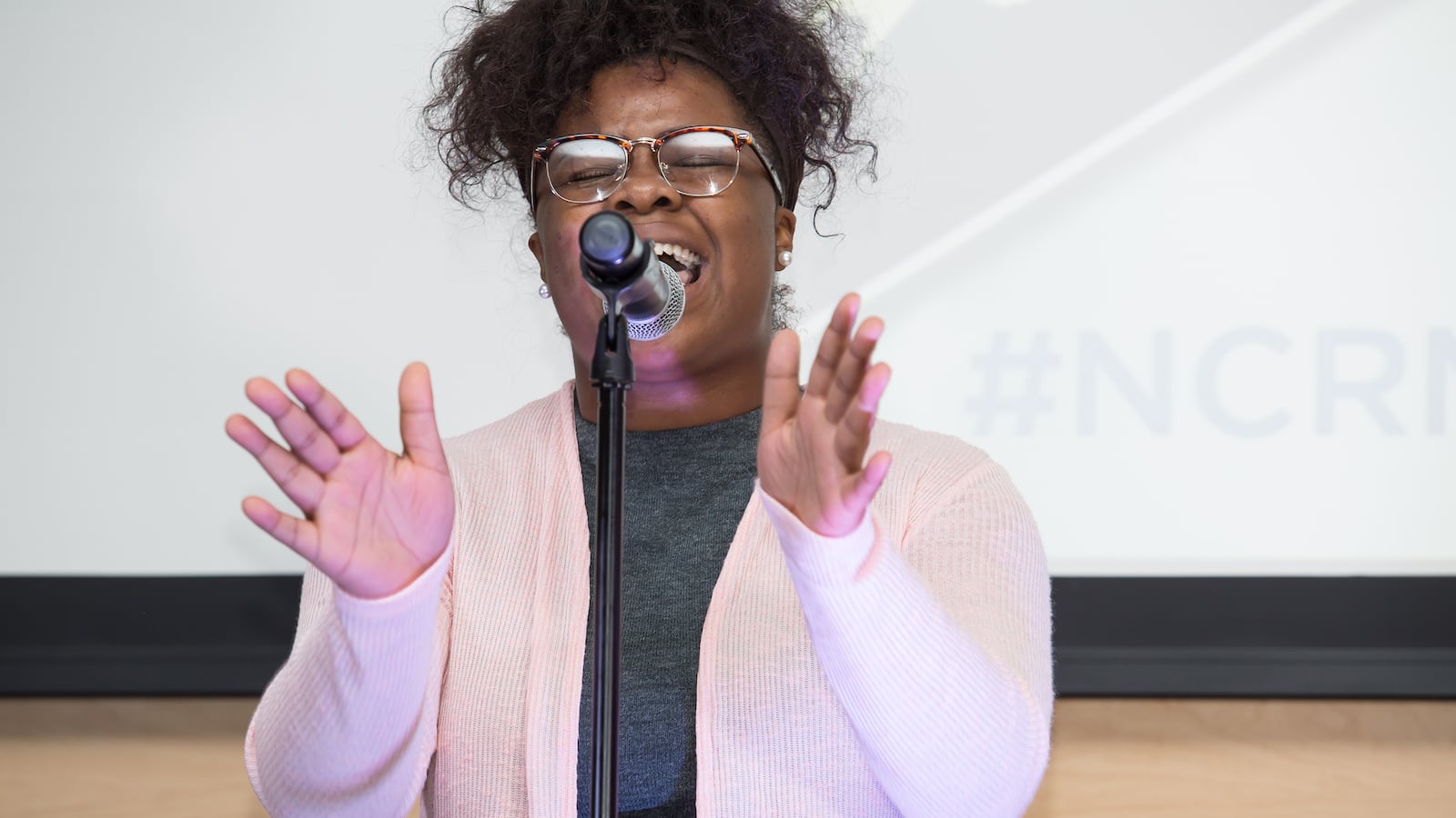 Kyla Lewis, a senior at GRAD Academy of Memphis, performs her poem that won first place in the teen category at the National Civil Rights Museum "Drop the Mic" poetry slam on Aug. 13.