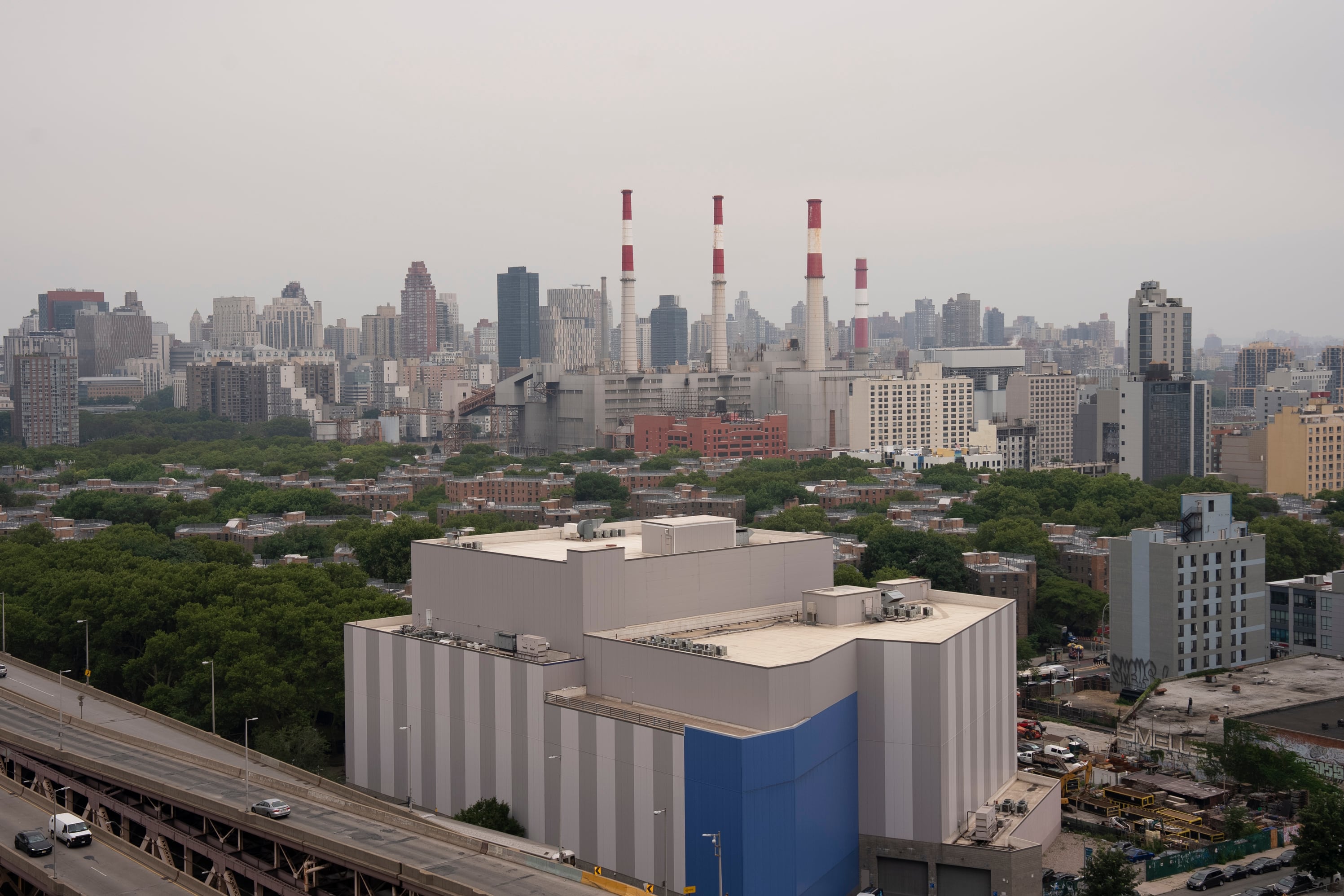 The sky above Manhattan is smoky.
