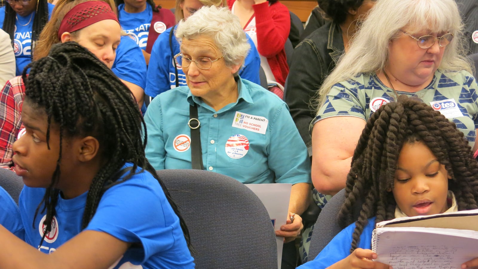 Students, parents and activists against vouchers fill a committee room at the Tennessee State Capitol.