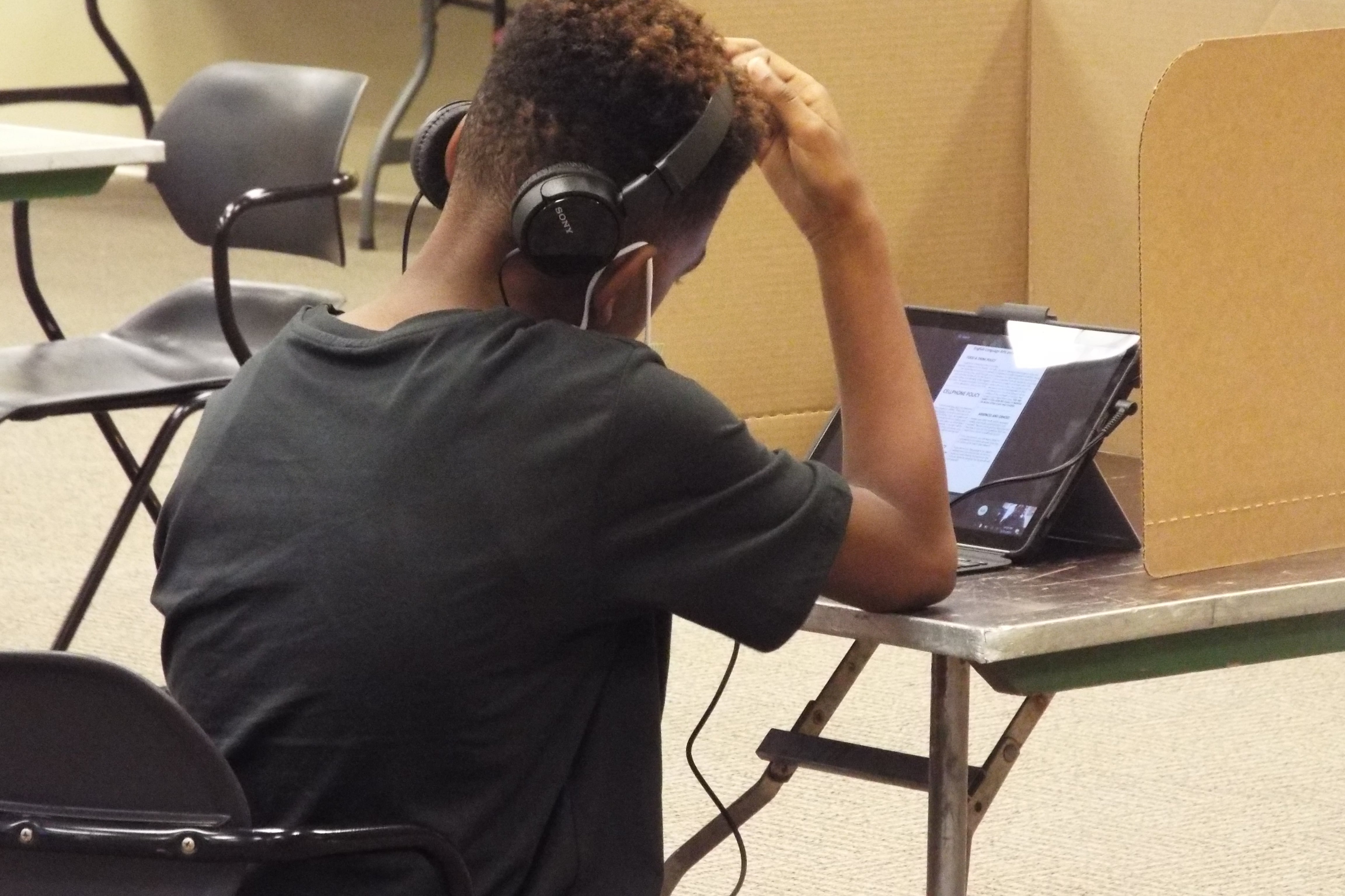 Shelby County Schools students works remotely from the YMCA’s virtual learning center on the first day of school.