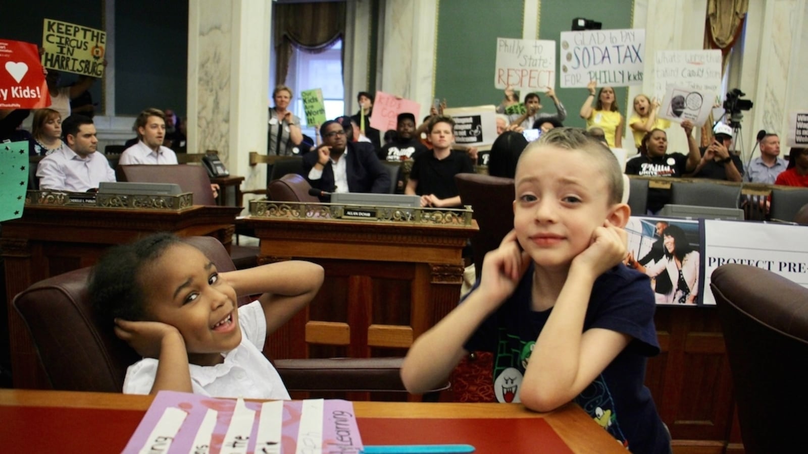 Children at a protest on soda tax.