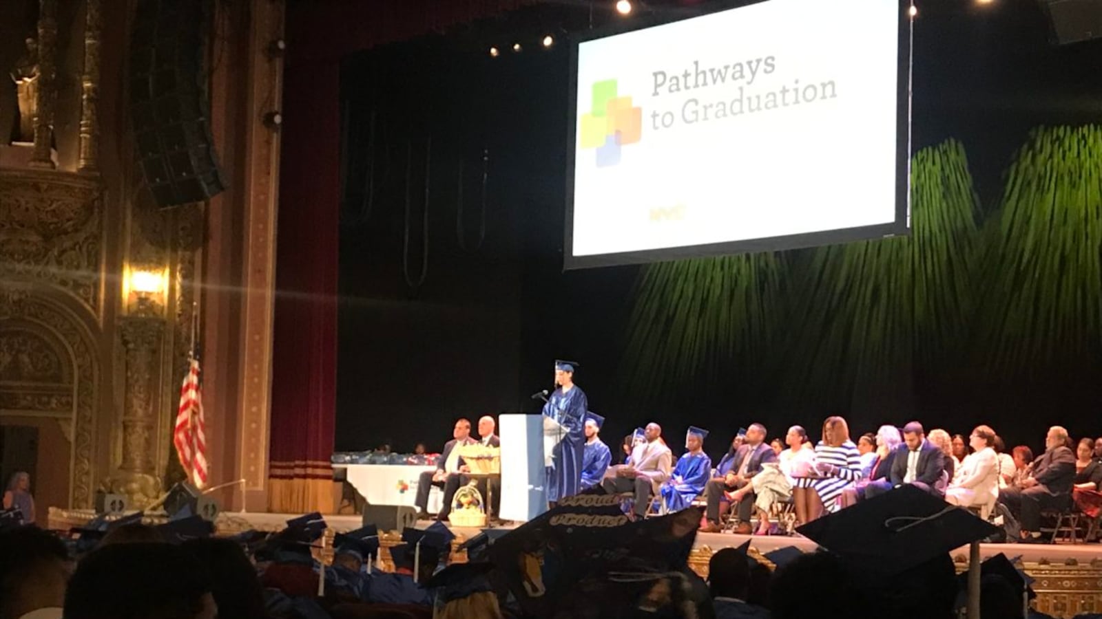 A student speaks to a crowd of graduates during the 2019 Pathways to Graduation ceremony in Harlem.