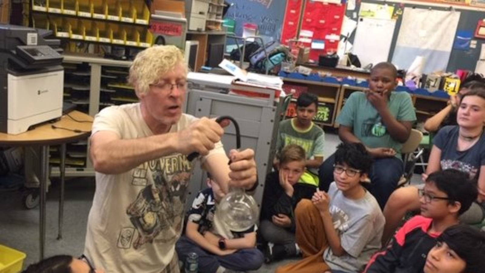 Greg Grambo, a 41-year science teacher at Louis Armstrong Middle School in Queens, demonstrates how clouds form.