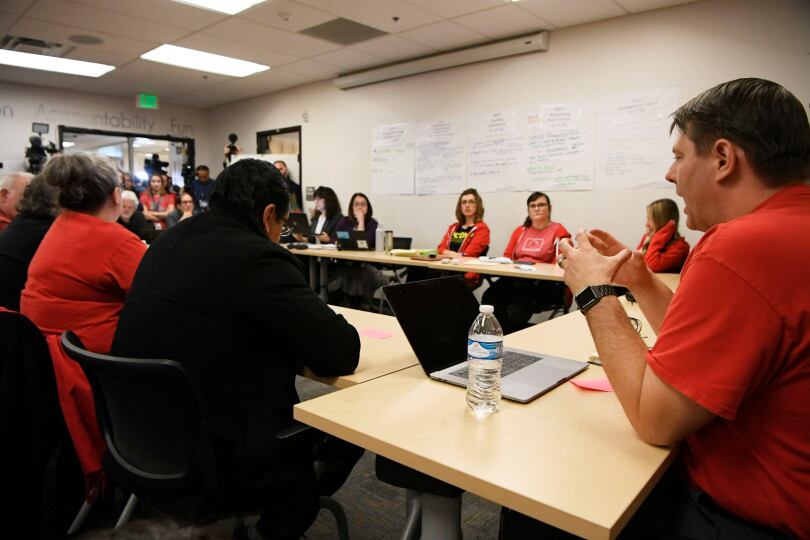 Denver Classroom Teachers Association lead negotiator Rob Gould, right, talks during a bargaining session with district administrators.