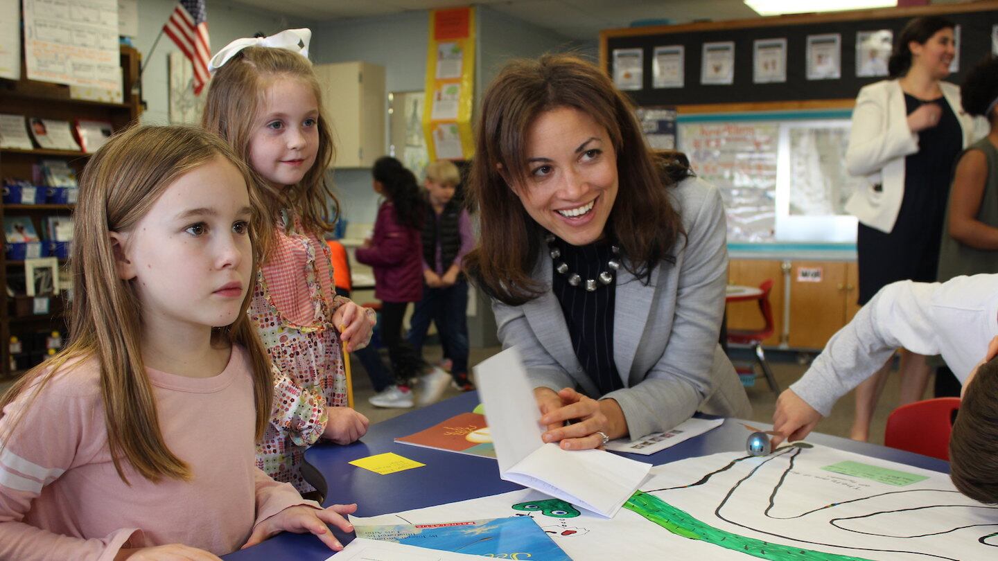 Penny Schwinn visits with students at a school in Rutherford County in February, soon after becoming education commissioner in Tennessee. (Photo courtesy of Tennessee Department of Education)